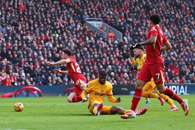 iogo Jota of Liverpool wins a penalty from Emmanuel Agbadou