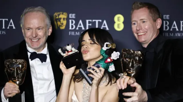 Aardman Animations' Nick Park, left, and Merlin Crossingham, with Camila Cabello