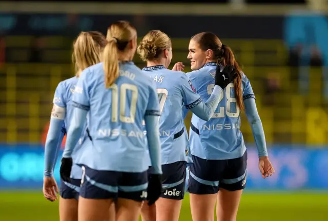 Manchester City's Gracie Prior celebrates scoring their side's fourth goal.