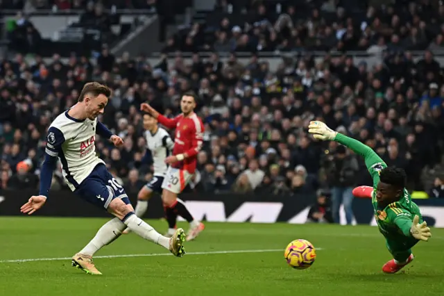 James Maddison (L) shoots to score