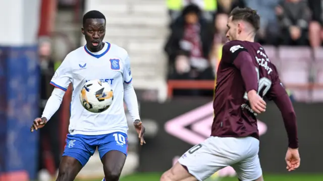 Rangers' Mohamed Diomande with Hearts' Jamie McCart