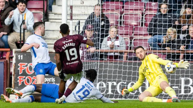 Hearts' Elton Kabangu is denied by Rangers goalkeeper Jack Butland