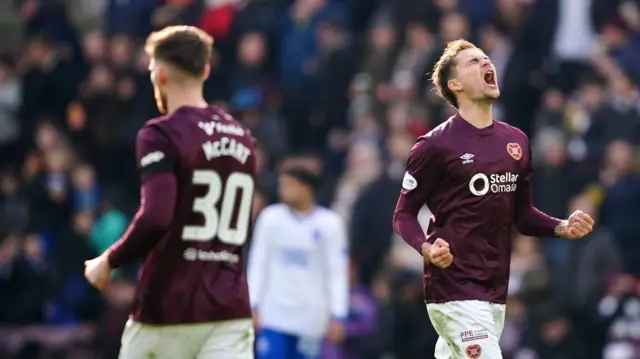 Michael Steinwender celebrates after scoring for Hearts against Rangers