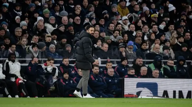 Manager Ruben Amorim of Manchester United watches from the touchline