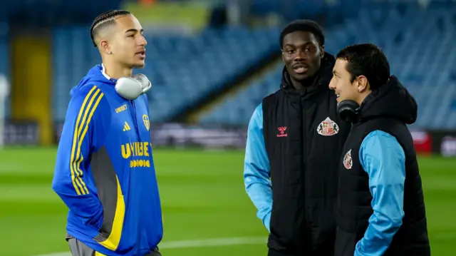 Leeds United forward Mateo Joseph talks to Sunderland players before the game