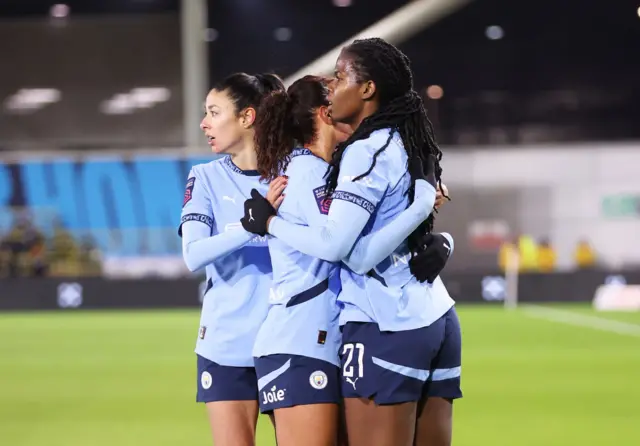 Khadija Shaw celebrates after scoring against Liverpool