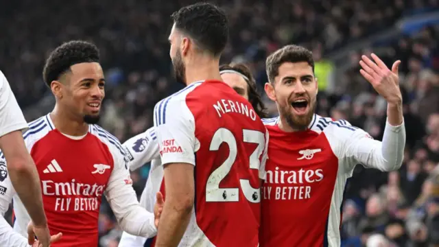 Mikel Merino celebrates scoring Arsenal's first goal with Jorginho