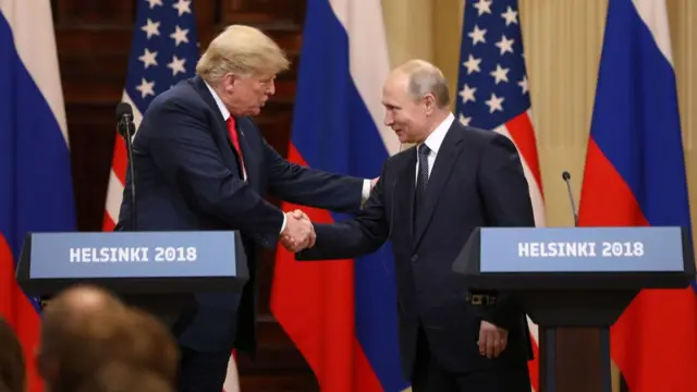 Trump and Putin shake hands in Helsinki