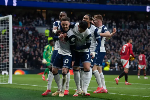 Tottenham's players celebrate after James Maddison scores