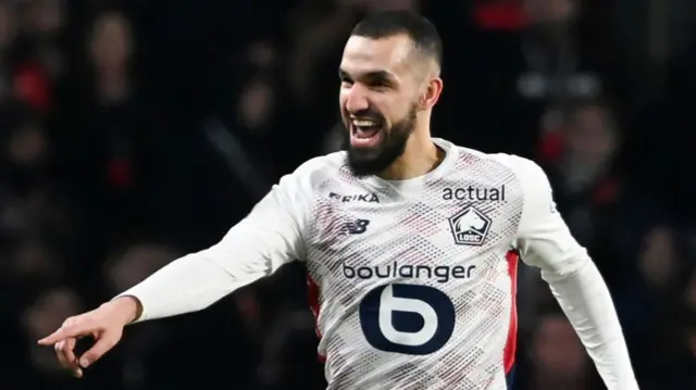 Lille midfielder Nabil Bentaleb celebrates scoring