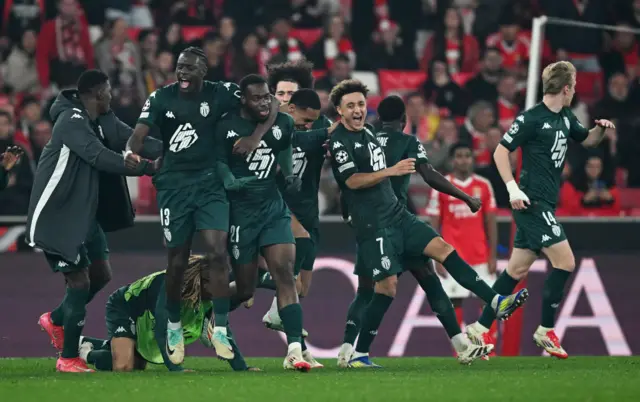 Ilhenikena celebrates his goal with teammates