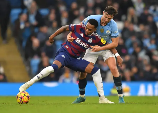 Nico Gonzalez tackles Jacob Murphy