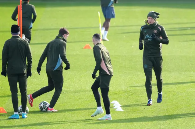 Manchester City's Erling Haaland (right) during a training session at the City Football Academy, Manchester.