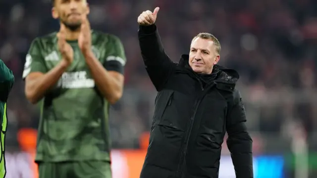 Brendan Rodgers gives a thumbs up to the Celtic fans at full-time