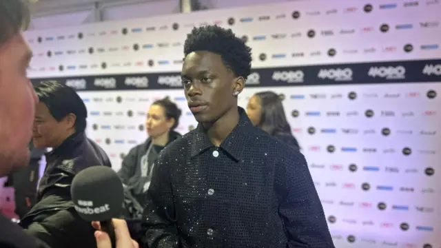 Leostaytrill speaks to the BBC on the red carpet