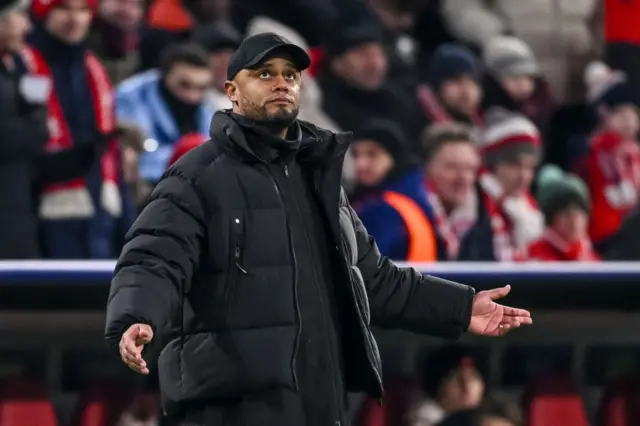 Vincent Kompany cuts a frustrated figure on the touchline