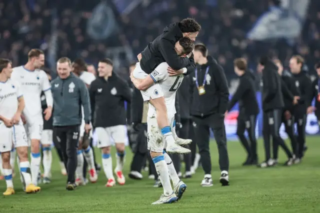 Brugge players celebrate their win