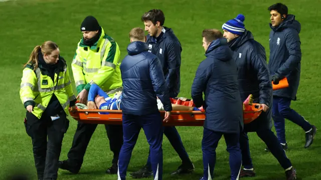 Jay Stansfield stretchered off