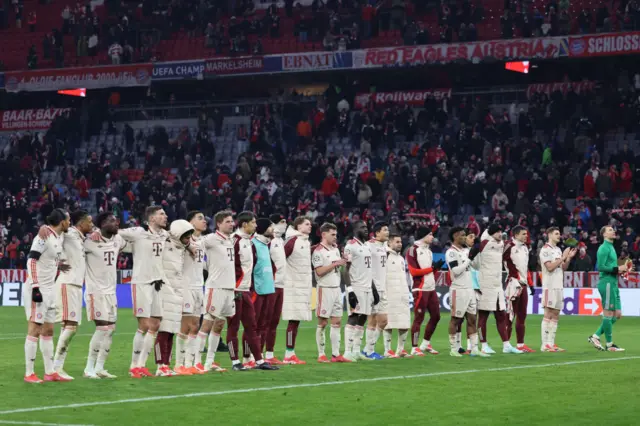 Bayern players celebrate in front of the fans at full time