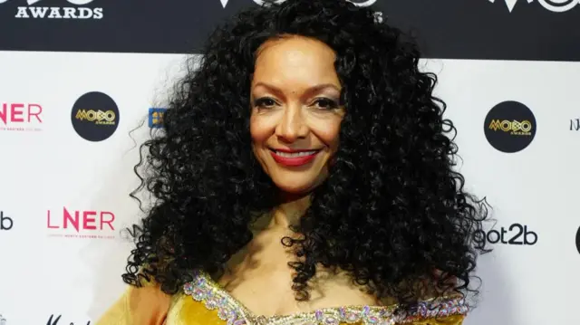 Kanya King smiles at the camera