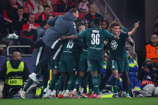 Eliesse Ben Seghir celebrates with teammates after equalising for Monaco