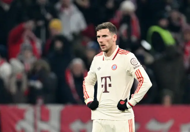 Goretzka stands with his hands on his hips