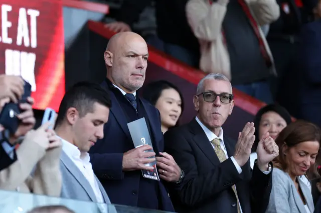 Howard Webb looks on