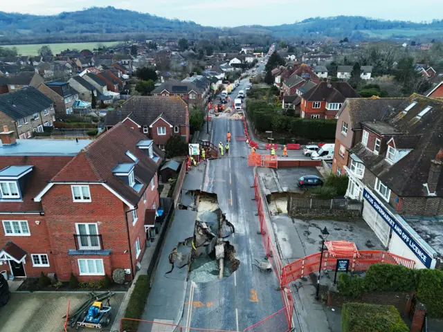 A drone view shows a large sinkhole in Godstone, southern Britain,