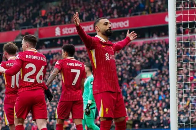 Salah celebrates his goal v Wolves