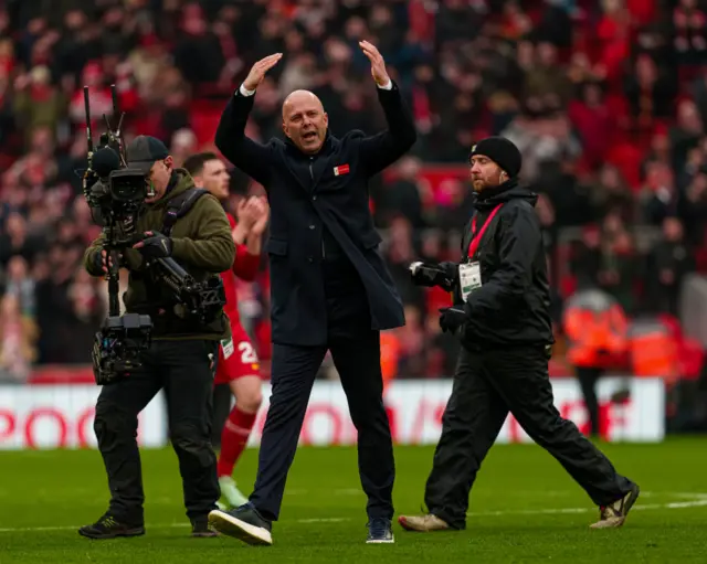 Liverpool manager Arne Slot with his hands in the air