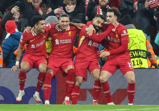 Liverpool's Mohamed Salah (2nd r) celebrates scoring the opening goal with Luis Diaz, Darwin Nunez and Curtis Jones