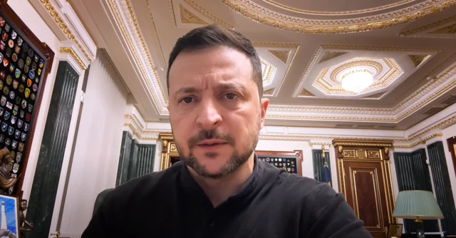 Ukrainian President Volodymyr Zelensky looks to the camera inside his office in Kyiv.