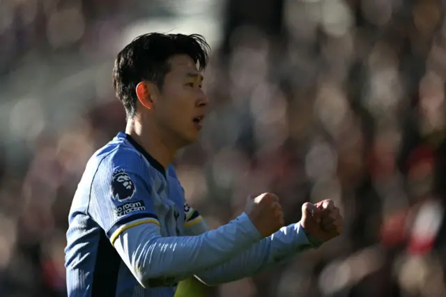 Son Heung-Min celebrates after setting up the opening goal,