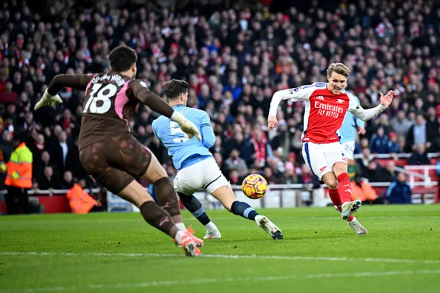 Martin Odegaard of Arsenal scores
