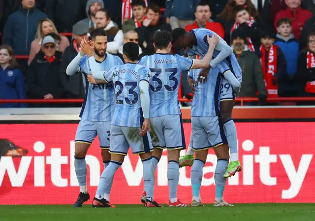 Tottenham Hotspur's Pape Matar Sarr celebrates scoring their second goal with teammates