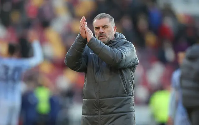 Tottenham Hotspur manager Ange Postecoglou applauds the fans