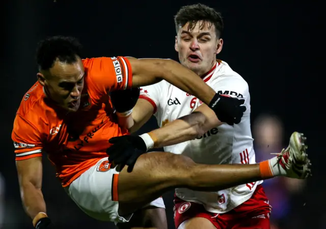 Tyrone's Michael McKernan tackles Armagh's Jemar Hall