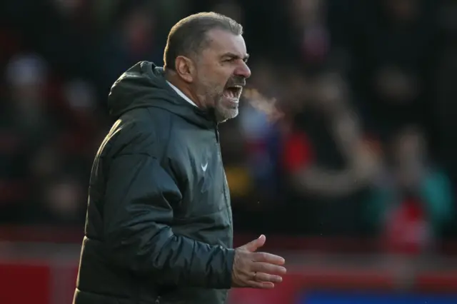 Tottenham Hotspur's Greek-Australian Head Coach Ange Postecoglou gestures