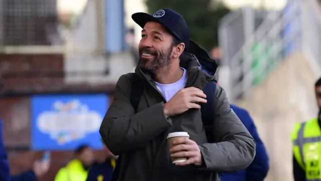 Bristol Rovers manager walks into the stadium