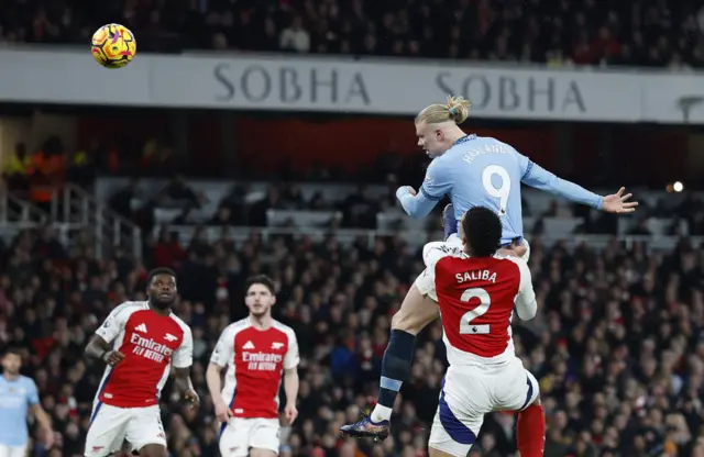Manchester City's Erling Haaland scores their first goal