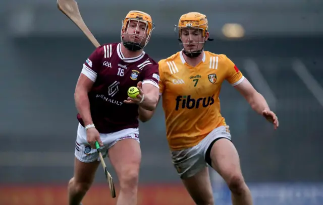 Antrim's Niall O Connor tackles Davy Glennon of Westmeath
