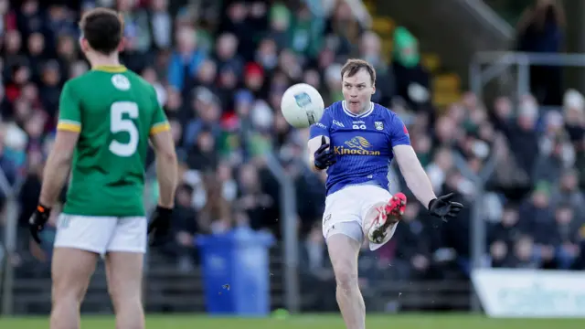 Cormac McKeogh slots over a two-point free for the Breffni visitors