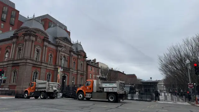 Small drone and dump trucks near the White House