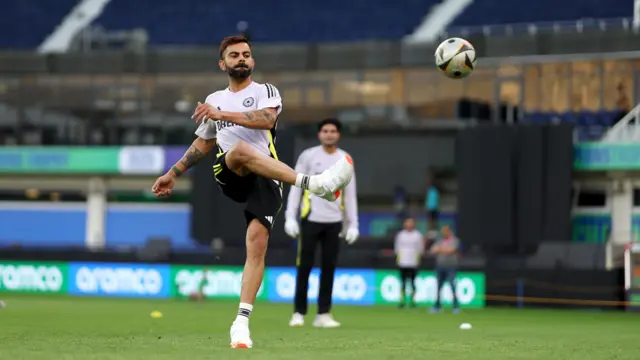 Virat Kohli playing football