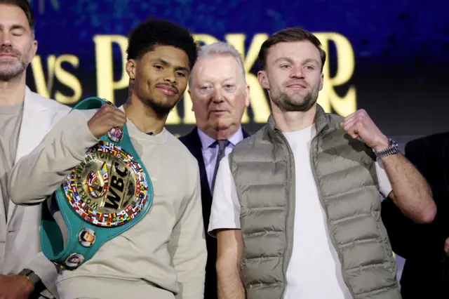 Shakur Stevenson and Josh Padley pose for pictures at a news conference