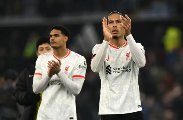 Jarell Quansah and Virgil van Dijk clap to the crowd at Villa Park