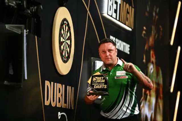 Gerwyn Price with the Premier League trophy