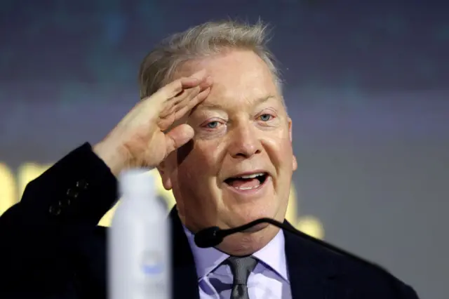 Frank Warren gives a salute