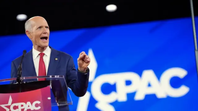 Senator Rick Scott speaks onstage at CPAC