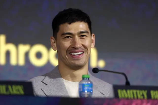 Dmitry Bivol smiles as he speaks